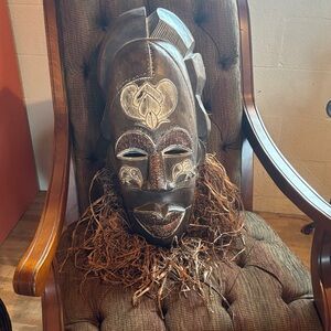 Handcrafted Tribal Mask with Intricate Patterns